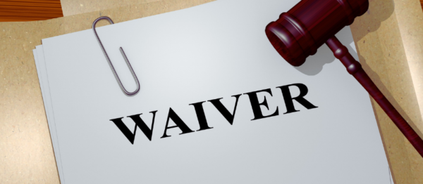 Waiver papers with gavel