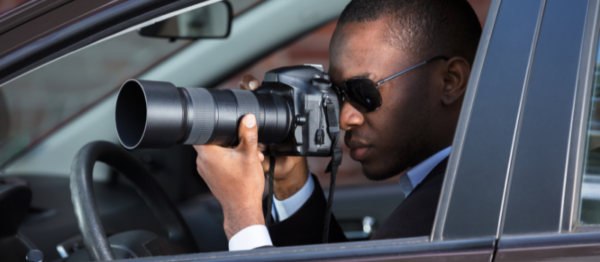 Man with a camera investigating