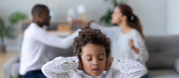 Parents argue as son covers ears