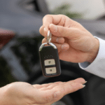 Wife handing over the keys to her ex.