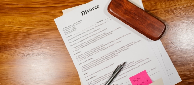 Person reviewing divorce paperwork in Texas