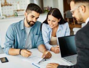 Couple reviewing a prenuptial agreement in Texas with an attorney