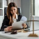 Attorney reviewing family law case documents in Fort Worth Attorney reviewing family law case documents in Fort Worth